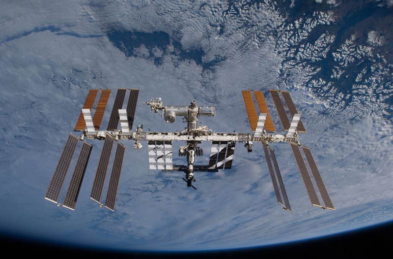 Russian Satellite Debris Zooms by Space Station